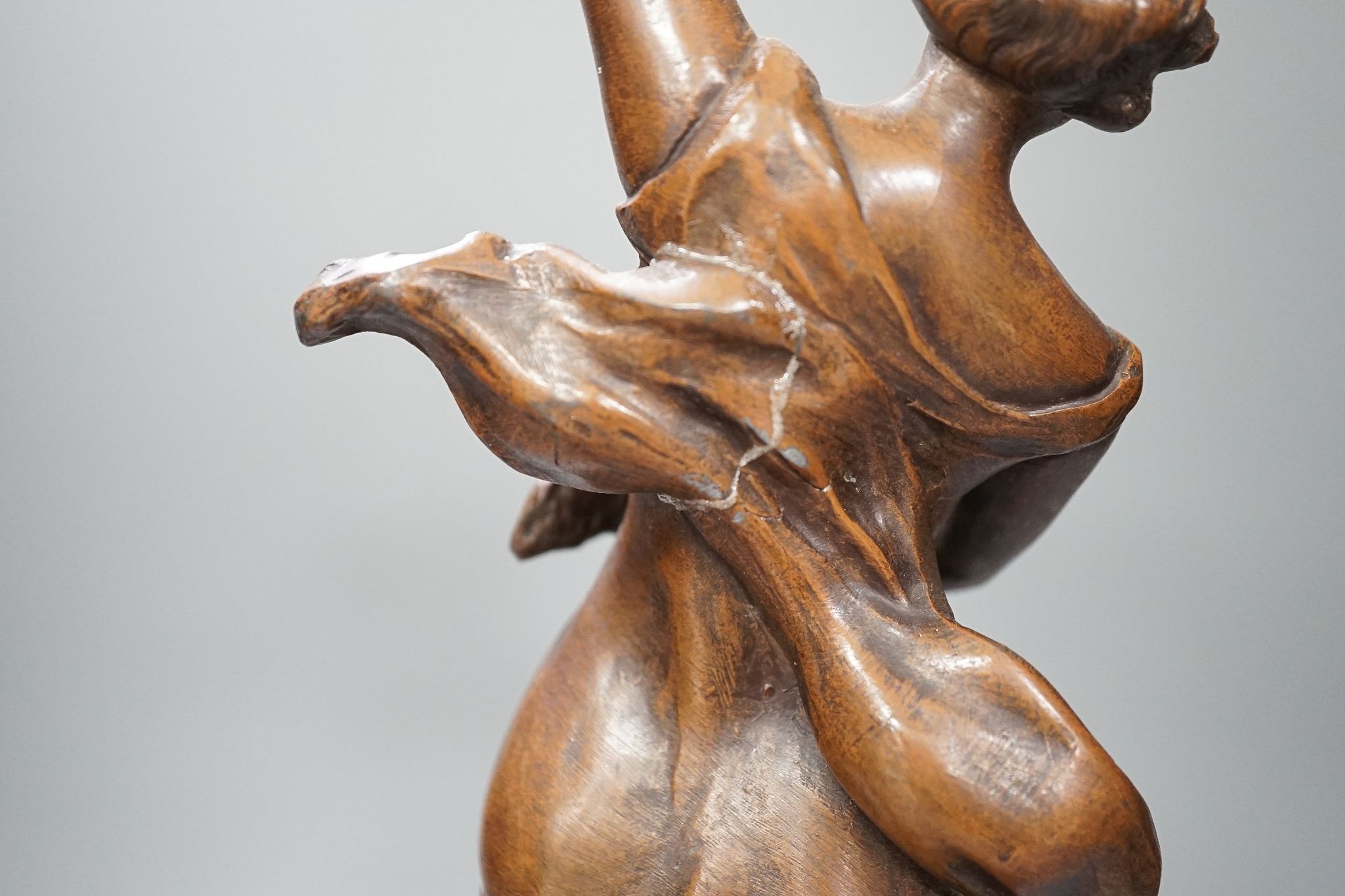 A pair of bronze female dancers, on marble plinths, 47cm